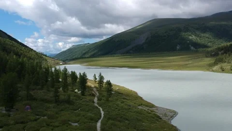 Mountains above the river Stock Footage 136914999