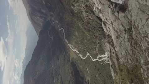 Mountains against the backdrop of a beautiful blue sky.(vertical video) Stock Footage 149107791