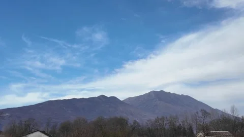 Mountains against a backdrop of a blue sky. Stock Footage 317630808