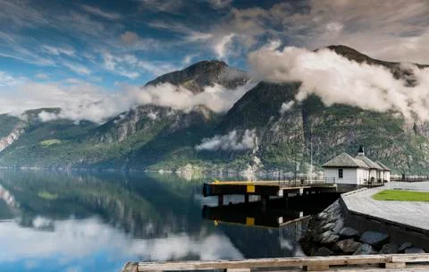 Mountains and clouds above the eidfjord in norway Stock Photos