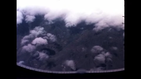 Mountains and Clouds from Airplane Stock Footage 278331799