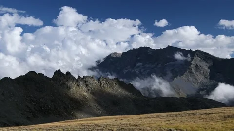 Mountains and clouds in the Gran Paradiso national park Stock Footage 207357001