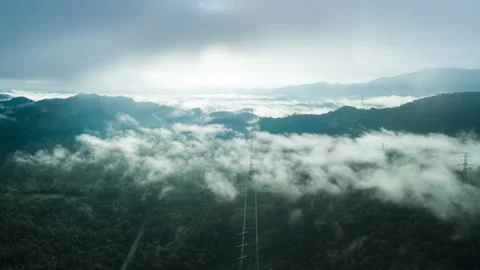 Mountains and clouds with High-voltage power pole Stock Footage 148482867