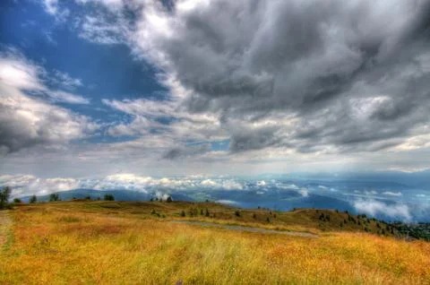 Mountains and clouds Stock Photos