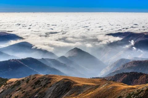 Mountains and clouds Stock Photos