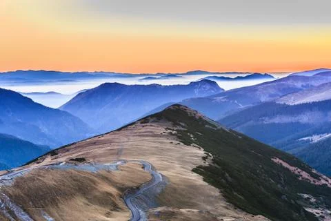 Mountains and clouds Stock Photos