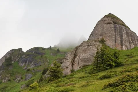Mountains and clouds Stock Photos