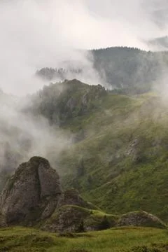 Mountains and clouds Stock Photos