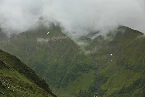 Mountains and clouds Stock Photos