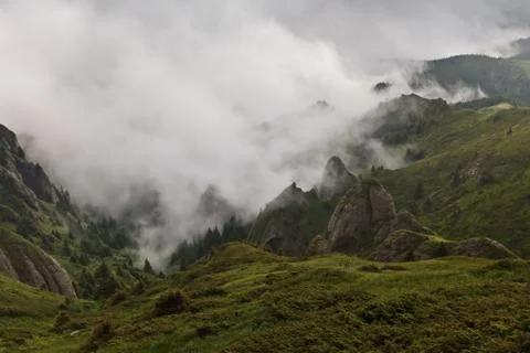 Mountains and clouds Stock Photos