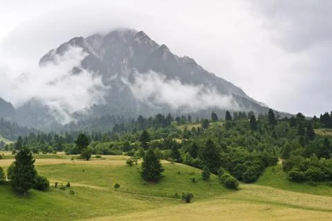 Mountains and clouds Stock Photos