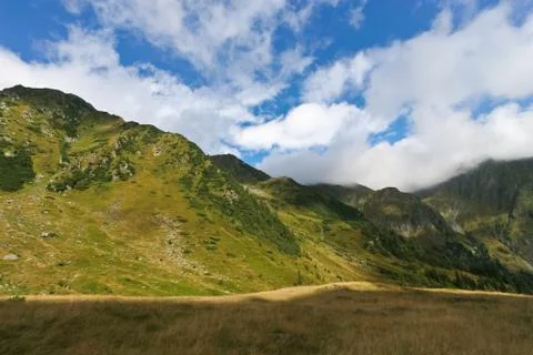 Mountains and clouds Stock Photos