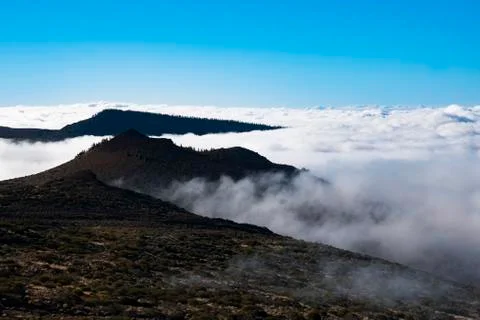 Mountains and clouds Stock Photos