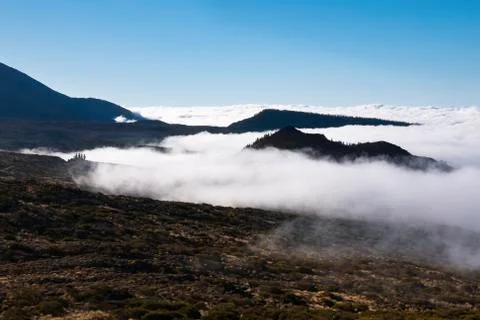 Mountains and clouds Stock Photos