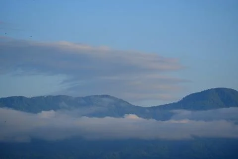 Mountains and clouds. Stock Photos