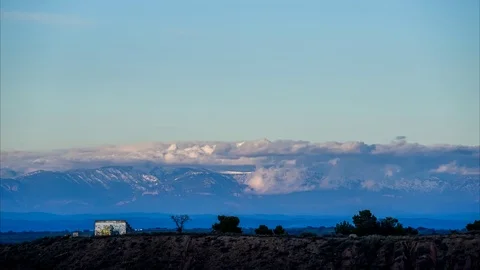Mountains and clouds scenery timelapse Stock Footage 123985942