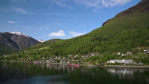Mountains and Fiord in the clouds over Olden, Innvikfjorden, Norway Stockbeeldmateriaal 242376514