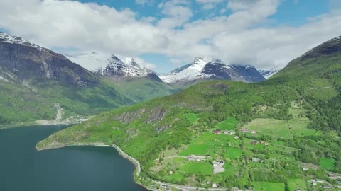 Mountains and Fiord in the clouds over Olden, Innvikfjorden, Norway Stock Footage 242596745