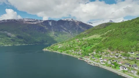 Mountains and Fiord in the clouds over Olden, Innvikfjorden, Norway 動画素材 242596959