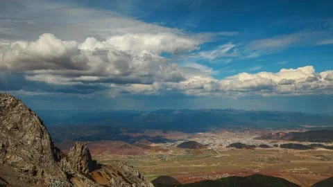 Mountains and floating clouds Stock Footage 173533498