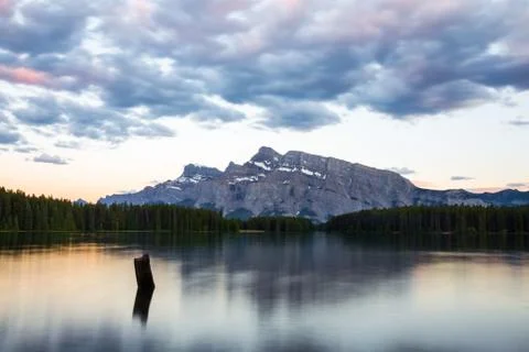 Mountains and forests reflected in Two Jack Lake Stock Photos