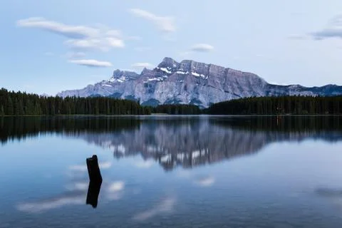 Mountains and forests reflected in Two Jack Lake Stock Photos