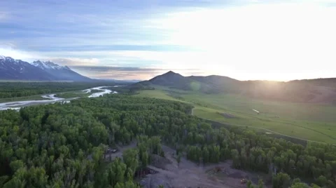 Mountains and Gorgeous Sunset in Wyoming by Aerial Drone Stock Footage