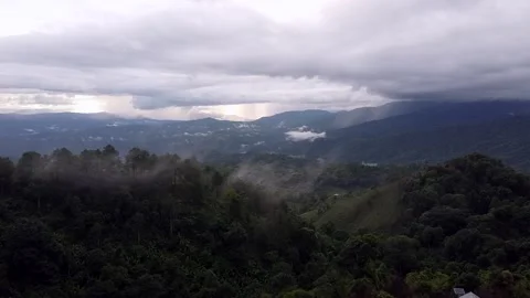 Mountains and green trees during the day Stock Footage 132957579