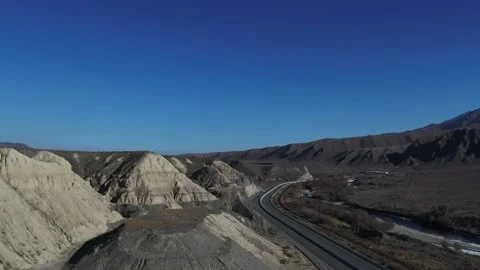 Mountains and a highway Video stock 189524245