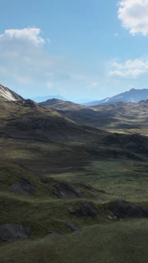 Mountains and hills under a clear sky with some clouds in the background Stock Footage 337948993