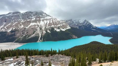 Mountains and lake view from high ground in Canada on a cloudy day. Peyto lake. Stock Footage 338282591