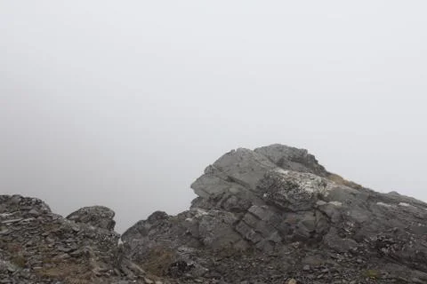Mountains and mist Stock Photos