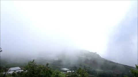 Mountains and mist Timelapse.  Stock Footage 65564963
