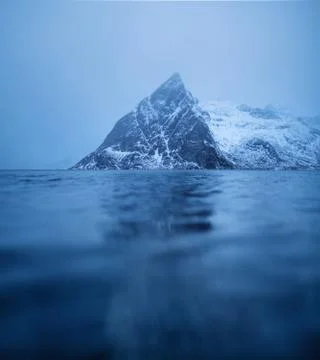 Mountains and reflection on the water Stock Photos