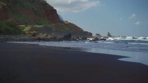 Mountains and sandy beach of the Atlantic Ocean on the island of Tenerife. Stock Footage 127794647