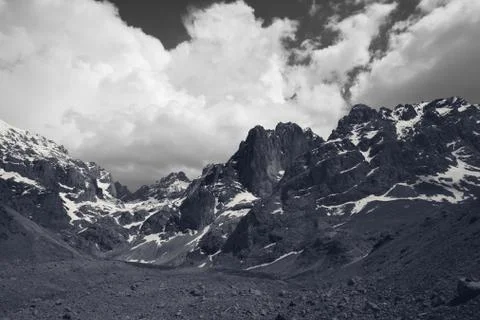 Mountains and sky with clouds Stock Photos