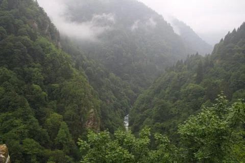 Mountains and stream Stock Photos