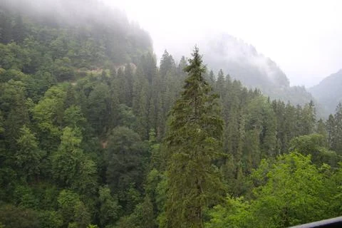 Mountains and stream Stock Photos