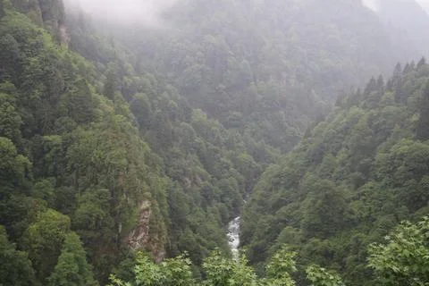 Mountains and stream Stock Photos