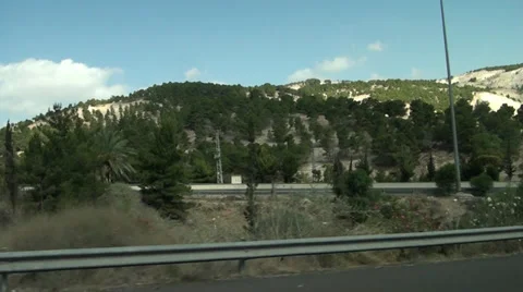 Mountains and trees through the window of rout taxi Stock Footage 39701397