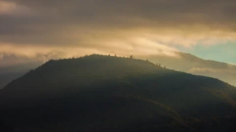 Mountains and valleys time lapse of puffy white clouds, blue skies and cloud sha 動画素材 53124224
