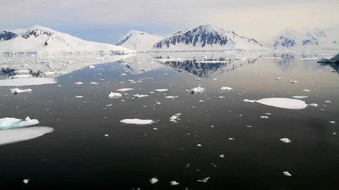 Mountains in Antarctica with floating ice 1 Stock Footage 88286338