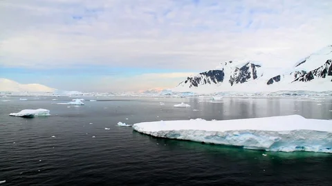 Mountains in Antarctica with floating ice 2 Stock Footage 88286353