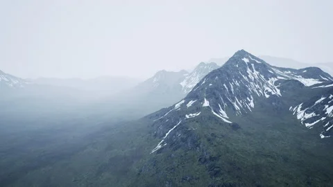 Mountains are hidden in low clouds and fog Stock Footage 229837211