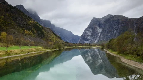 Mountains are reflected in the river Stock Footage 250462265