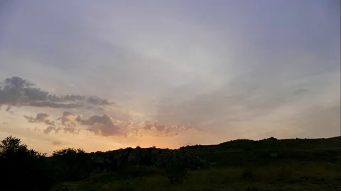 Mountains in the background of gray clouds. Dark clouds envelop the tops of the Stock Footage 97596180