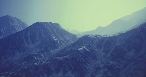 Mountains bathed in soft light revealing textured peaks and valleys Stock Illustration