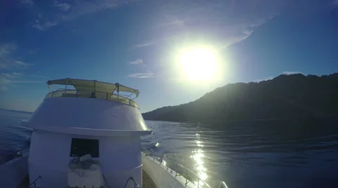 Mountains on beach. Water surface. Captain helm boat. Background 4k video. Stock Footage 65395987