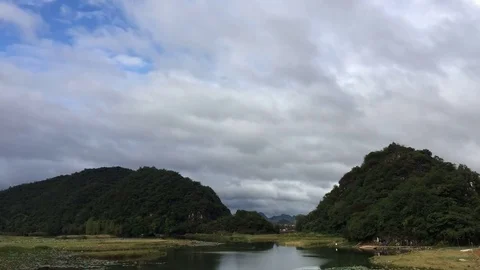 Mountains blue sky and clouds time lapse Stock Footage 82117845