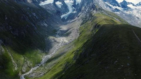 Mountains, clouds and green trees with Rivers Stock Photos
